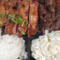 Combo Plates · Any two entrées served with two scoops of rice & mac salad. Substitute rice and mac with ter...