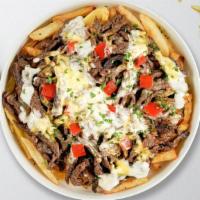 Philly Pursuit Fries · Steak, caramelized onions, bell peppers, and melted cheese topped on Idaho potato fries.