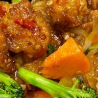 Gai Som (Orange Chicken) · Crispy battered chicken, broccoli, onion, carrot, tangy orange sauce.