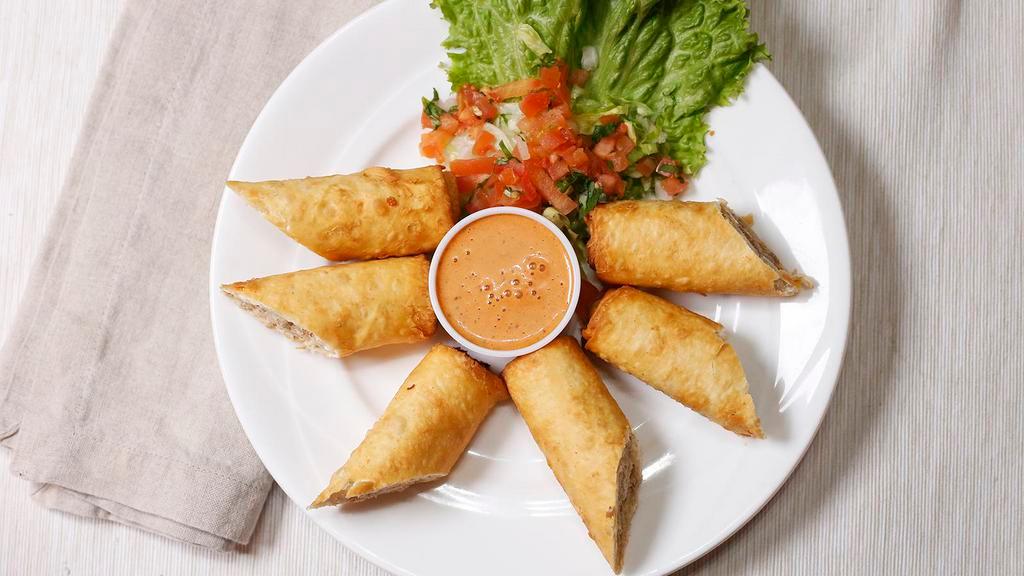 Mini Chimis · Six slices of chimichanga deep fried to golden brown, choice your meat ( shredded beef or chicken ) served with chipotle dipping.