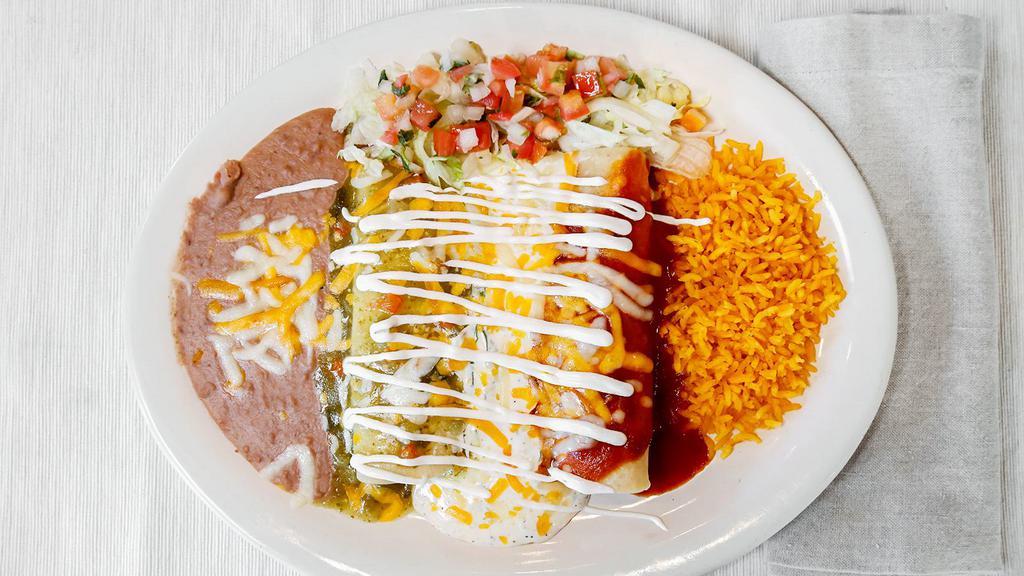 Enchilada Tricolor · Three enchiladas and one shredded beef topped with enchilada sauce. One chicken topped with verde sauce. One cheese topped with sour cream sauce. All three are smothered with jack cheese. Served with rice and beans. With four ounce salsa and chips.