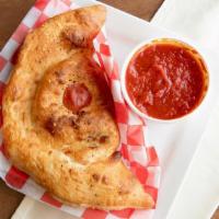 Cheese Calzone · A three-cheese blend of ricotta, Mozzarella and parmigiana, mixed with spices, and wrapped i...