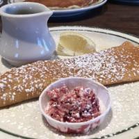 Swedish Pancakes · Dusted with powdered sugar, topped with lingonberry butter