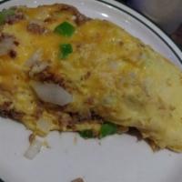 Hobo Omelette · Lean ground beef, diced potatoes green peppers, onions and tillamook cheddar cheese