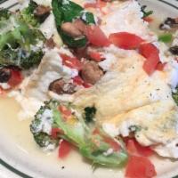 Garden Omelette · Cheddar and Swiss cheese with fresh mushrooms, green peppers, diced tomatoes, broccoli, avoc...