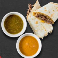 Carne Asada Burrito · A flour or wheat tortilla with grilled steak topped with mild sauce, cheese, lettuce, guacam...