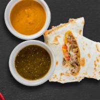 Carnitas Burrito · A flour or wheat tortilla with braised pork shoulder topped with mild sauce, cheese, lettuce...