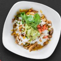 Steak Burrito Bowl · Grilled steak and special spices, and topped with cheese, sour cream, guacamole, and rice. C...