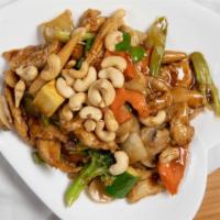 Cashew Chicken · Chicken stir-fried with celeries broccoli snow peas white mushroom carrots water chestnuts a...