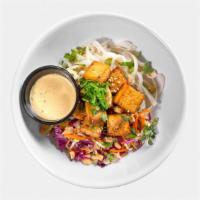 Vegan Pad Thai Bowl · Tofu, rice noodles, vegan slaw, no-peanut sauce topped with chopped cashews, cilantro and gr...