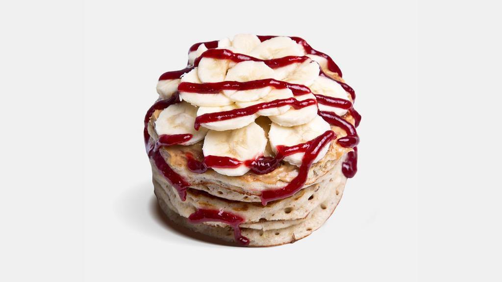 Pb And J Pancakes · Non-GMO Whole Grain Whey Protein Pancakes topped with Peanut Butter, Banana  and Sugar Free Jelly.

( 502 cal | 5 protein, 48 carb, 33 fat)