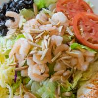 Shrimp Salad · Delicious shrimp sitting atop fresh greens, garnished with egg, Danish cheese, black olives,...