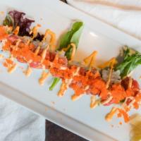 *Red Dragon Roll · Tempura Shrimp, avocado, topped with spicy tuna, spicy mayo and tobiko.