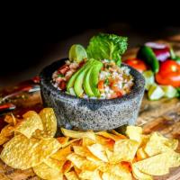 Ceviche · Gluten-free. Shrimp marinated in tangy lime juice tossed with tomato, cilantro and onions; g...