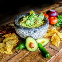 Guacamole · Gluten-free. We use the freshest of avocados, tomato, onions, cilantro, chopped jalapeño pep...