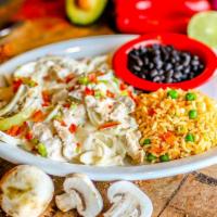 Arroz Con Pollo · Gluten-free. Plump sliced chicken breast sautéed with fresh mushrooms, onions with queso dip...