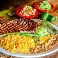 Carne Asada · Gluten-free. Steak marinated in special seasonings and grilled to your liking. Served with M...