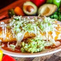 Miguel'S Fiesta Fajita Burrito · A flour tortilla filled with your choice of grilled chicken or steak, mixed shredded cheese,...