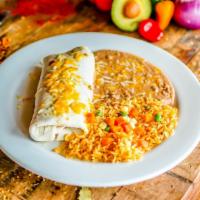 Kid Burrito · Flour tortilla filled with refried beans and cheese, chicken, shredded beef, or ground beef....