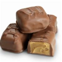 Milk Chocolate Peanut Butter Meltaways · Peanut butter lovers rejoice! This is the perfect combo covering a smooth and creamy peanut ...