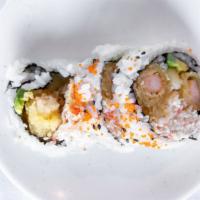 Shrimp Tempura Roll · Temp shrimp, crab salad, avocado, cucumber, massago.