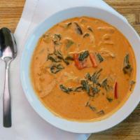 Red Curry · Red curry paste with bamboo shoot, eggplant, carrots, bell pepper, basil in coconut milk.