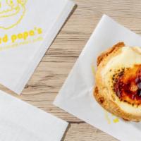 Creme Brulee · A rich smooth vanilla custard base with a crunchy caramelized crust on top.
