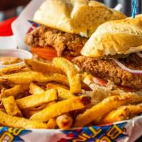 Fried Chicken Sandwich · Special marinated chicken breast fried crisp to a golden brown, topped with lettuce, tomato,...