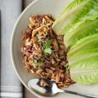 Korean Steak Lettuce Wraps.. · sliced flat iron steak, onions, cabbage, spicy gochujang