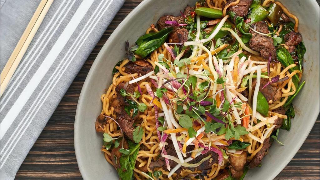 Jeweled Beef · snap peas, spinach, mushrooms, thai basil, yakisoba noodles, spicy chili-soy