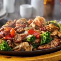 Blackened Chicken & Pork.. · broccoli, red bell peppers, onions, mushrooms, spicy ginger-soy