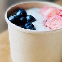 Berry Well · oats, coconut milk, chia seeds, vanilla, honey, greek yogurt, strawberries, blueberries