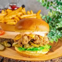 Messiah Chicken Burger · American cheese, messiah sauce, and pickle. Crispy, hand-breaded, whole boneless chicken thi...