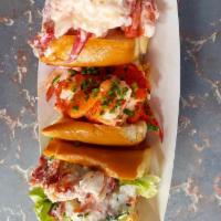 Slider Trio Lobster Rolls- Pick Your Trio · Three 2oz Sliders of Your Choice: Maine Shack, Fancy, Brown Butter, Connecticut, or Naked. S...