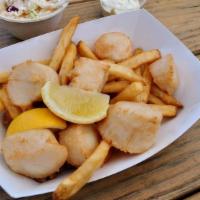 Fried Scallops - 1/2 Lb · *Based on Market Price* *Lightly Coated & Flash Fried.* Served with Fries, Slaw, & Tartar Sa...