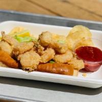 Shrimp Roll · Fried Shrimp, Bibb Lettuce, & Tartar Sauce on New England Style Bun. Served with Chips.