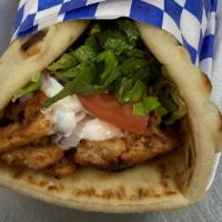 Chicken Gyro · Comes with Lettuce, Tomato and Onion and topped with our Tzatziki Sauce wrapped in a Pita Br...