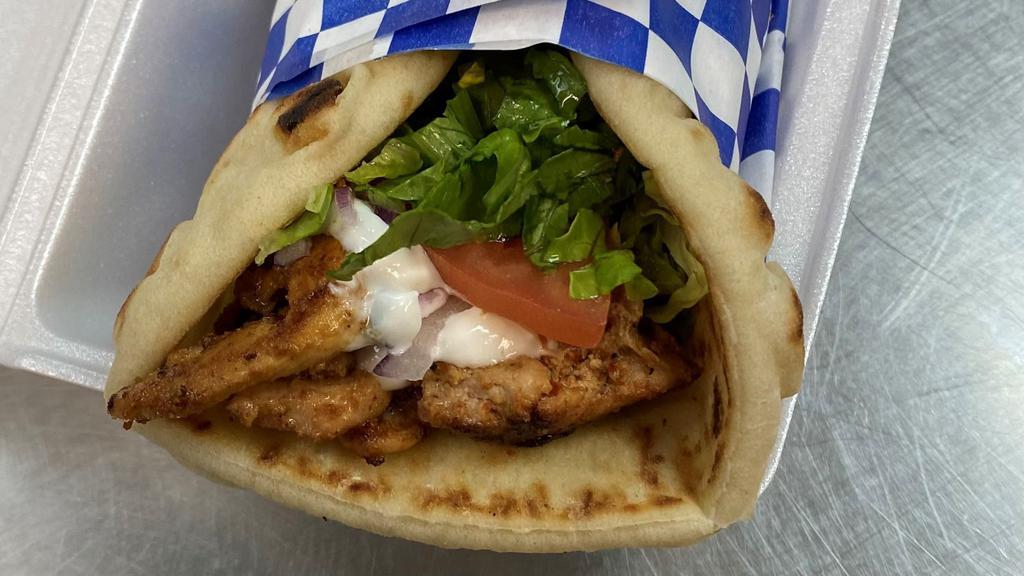 Chicken Gyro · Comes with Lettuce, Tomato and Onion and topped with our Tzatziki Sauce wrapped in a Pita Bread