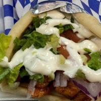 Buffalo Chicken Gyro · Chicken Gyro tossed in Buffalo Sauce and comes with Lettuce, Tomato and Onion and topped wit...