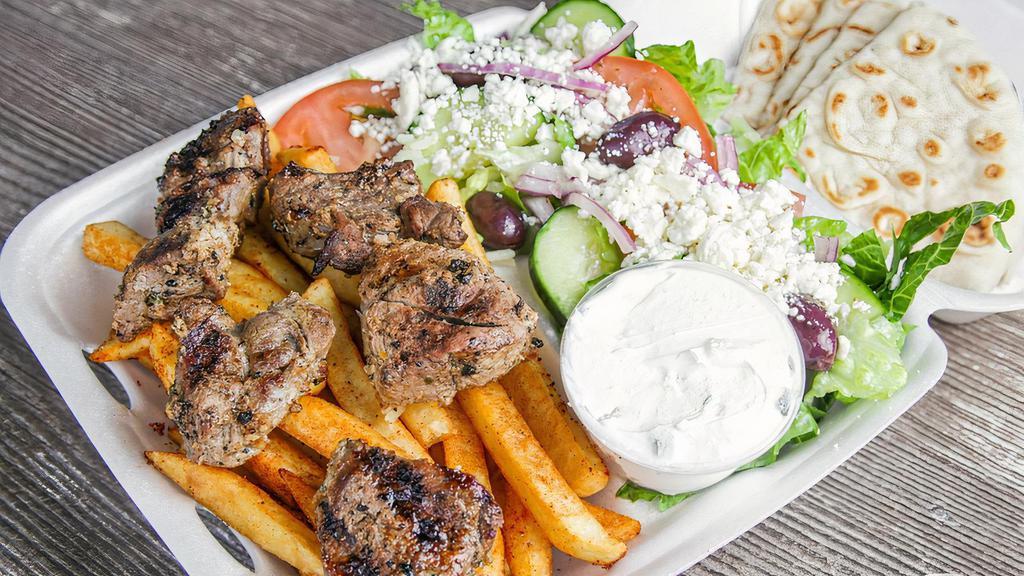 Beef Souvlaki Plate · Comes with a choice of French Fries or Rice, Greek Salad, Small Side of Tzatziki and Pita Bread.