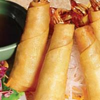 Lanna Prawn Rolls · Prawns wrapped in rice paper & deep fried. Served with plum sauce.