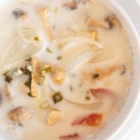 Tom Ka  · Hot & sour soup with coconut milk, mushrooms, lemon grass, kaffir lime leaves & cilantro.