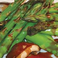 Asparagus · Served with Chinese black mushrooms and chili paste. These fresh vegetables are quick stir f...