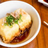 Agedashi Tofu · Lightly fried soft tofu with day bonito and green onions. In special soy sauce.