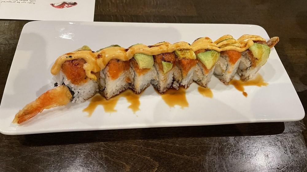 Tiger Roll · Most popular. Shrimp tempura roll topped with spicy tuna and avocado. Eel sauce and spicy mayo.