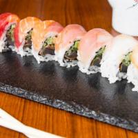 Sunrise Roll · Cajun albacore, cucumber, avocado wrapped in variety fish. With garlic ponzu sauce.