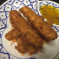 Fried Calamari · Fried breaded strips of squid served with sweet and sour sauce.