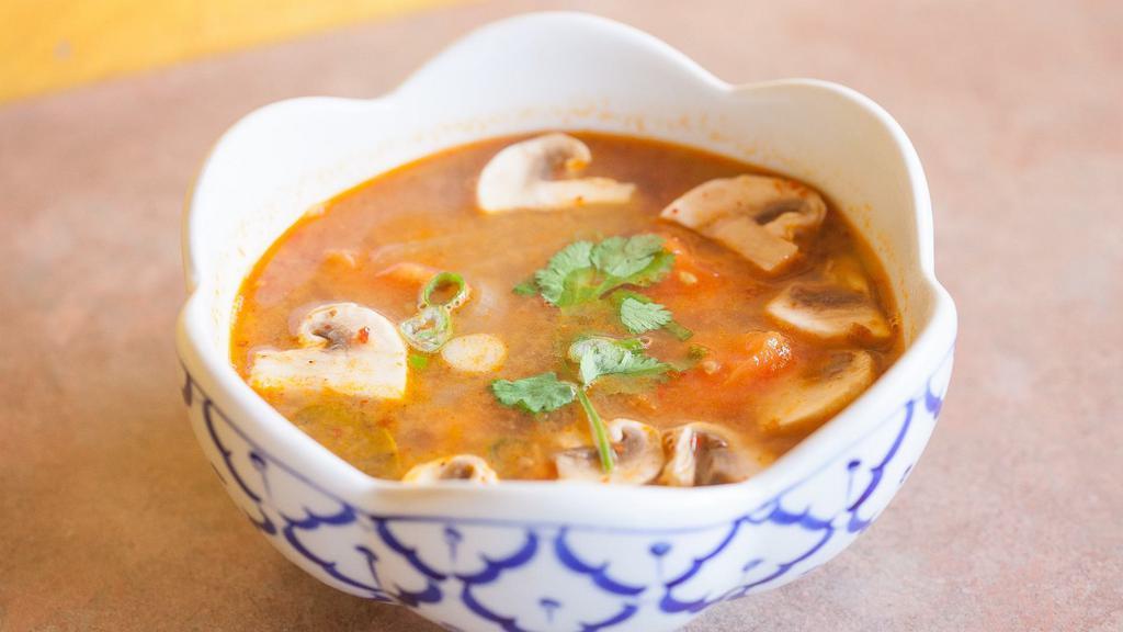 Tom Yum · Hot and sour soup with mushroom, tomatoes, onion, mixed with Tom Yum paste. Choice of chicken, tofu or shrimp.