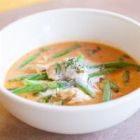 Panang Curry · Panang curry sauce and coconut milk simmered with green beans, and basil leaves.