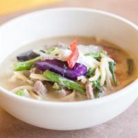 Kaeng Kiew Wan(Green Curry) · Green curry sauce and coconut milk simmered with green beans, eggplant, bamboo shoots, and b...